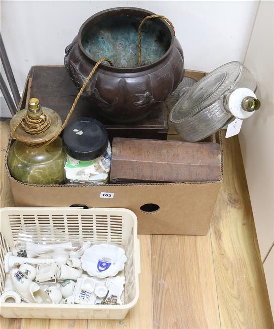 A group of mixed boxes, lamps, a bronze planter, lamp and crested ware etc